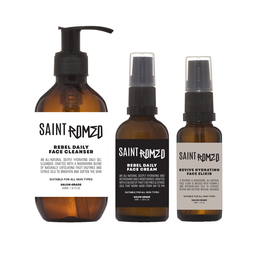 Set of Saint Romeo skincare products including Rebel Daily Face cleanser, Rebel Daily Face Cream, and Revive Hydrating Elixir